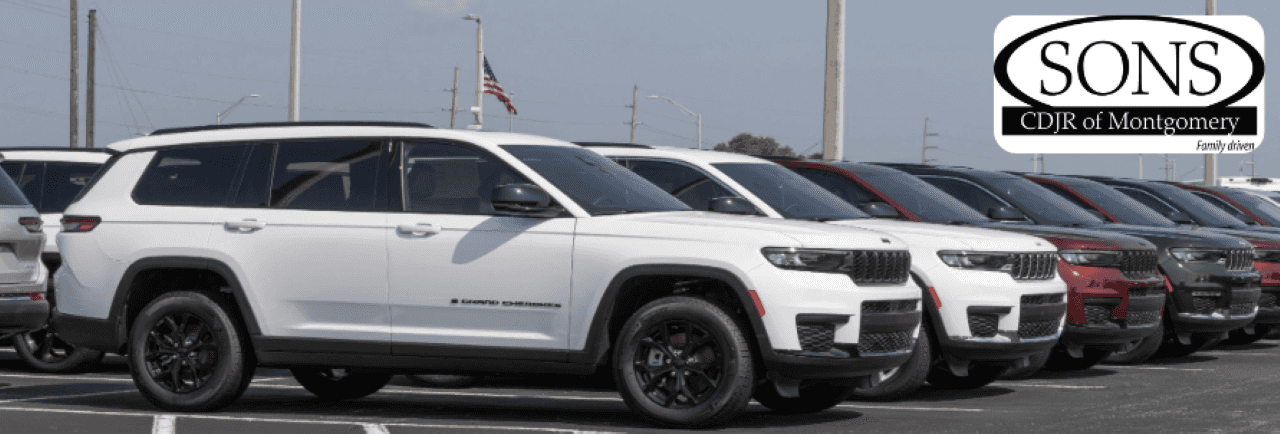 SONS CDJR dealership exterior with a range of Jeep models parked outside.