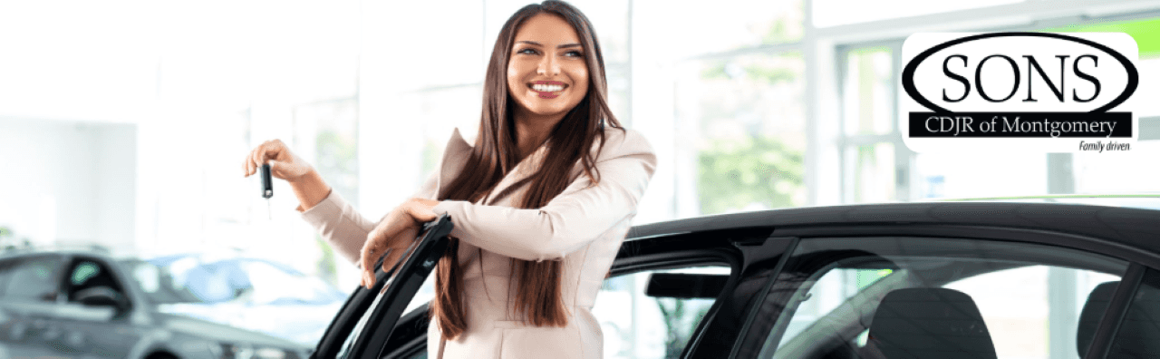 A photo to portray a satisfied family exploring car options at SONS CDJR, highlighting excellent customer service and family-friendly support.