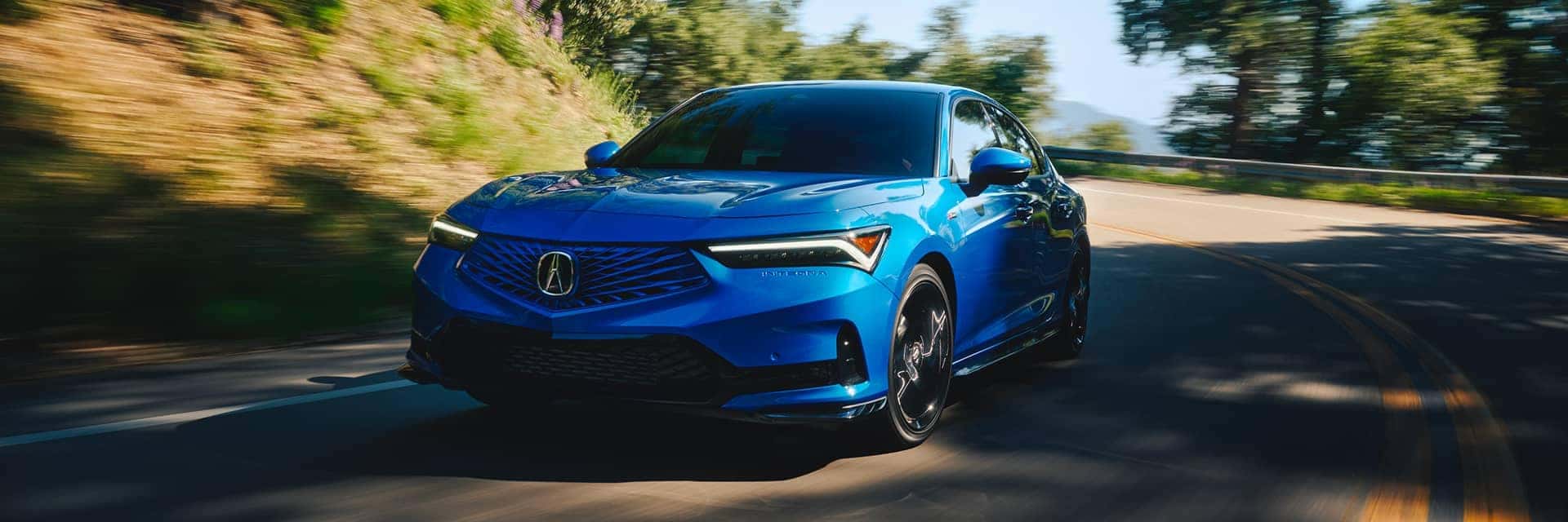 blue 2026 acura integra driving