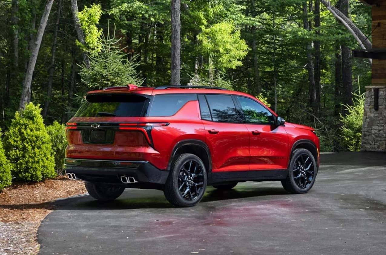 Chevrolet SUV parked in the woods