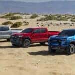2023 Chevrolet Colorado ZR2 Trim line up of colorado trucks in the sandy desert