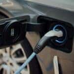 Chevrolet EV charging port plugging in EV to charge in Fort Worth, TX
