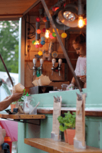 Girl working a festival stand in Columbia, TN.