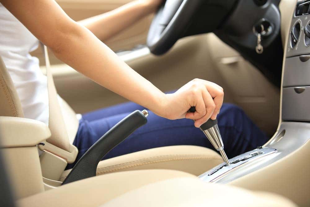 Woman Driving a Stick Shift