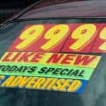 Used Car Windshield with Pricing Information