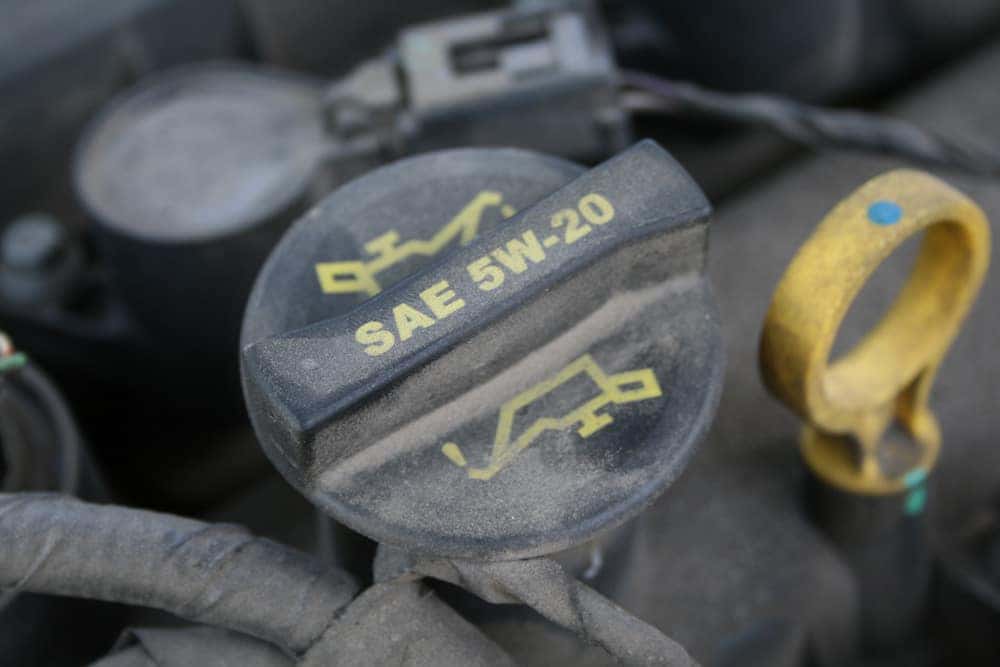 Oil Cap With Letters SAE on It