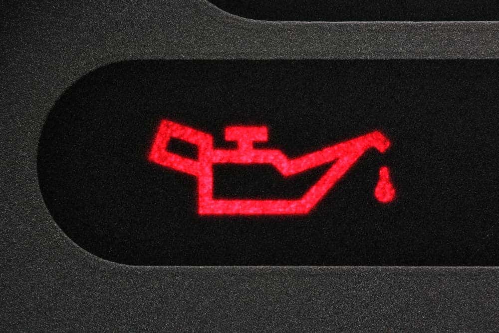 Red Oil Warning Light on a Car Dashboard