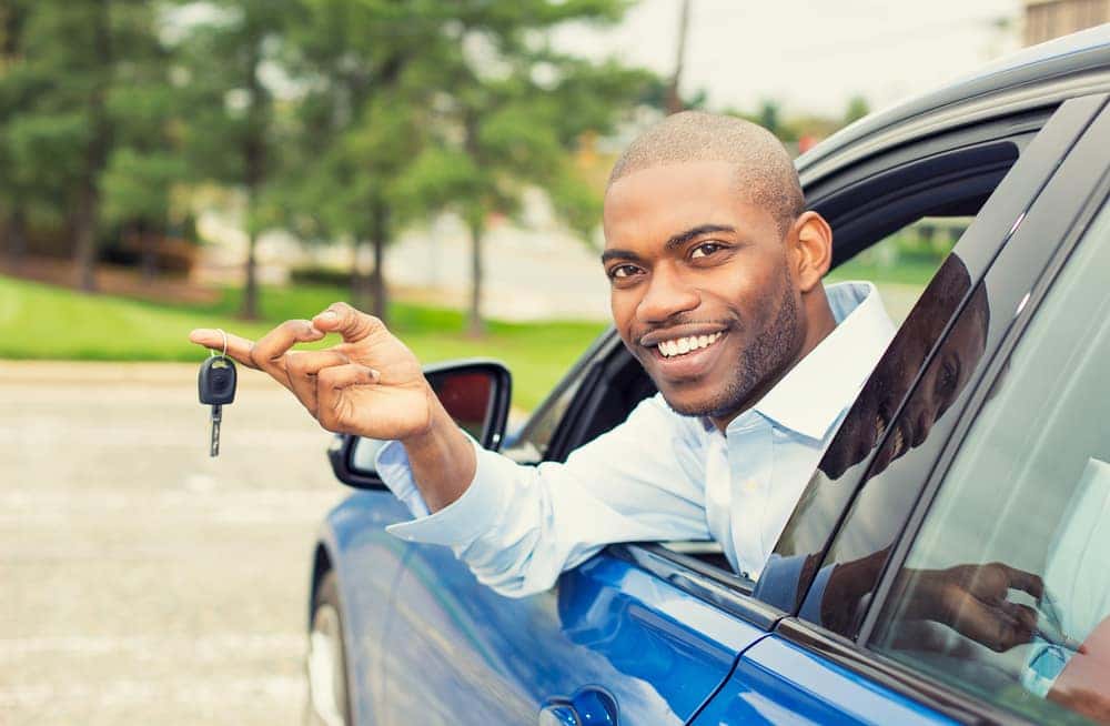 Young Man In the Driver's Seat With Car Keys