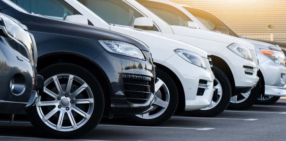 rows of used cars on a lot