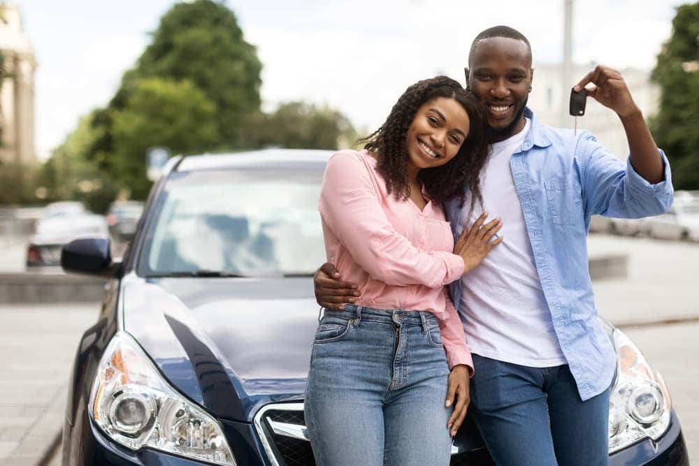 Happy Couple with New Car Keys