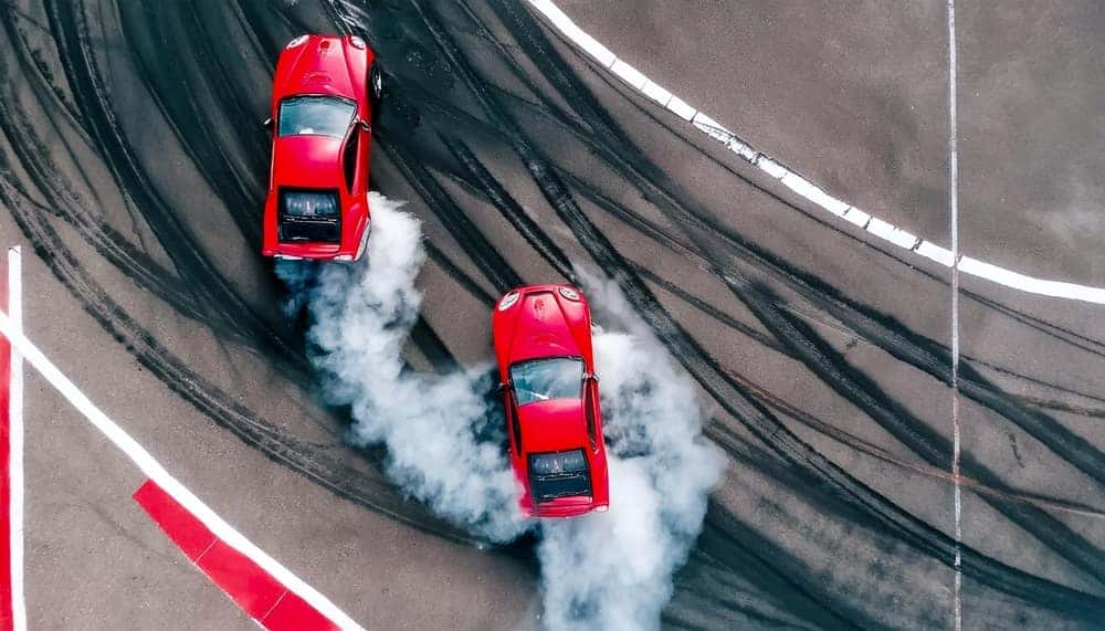 Aerial View Two Cars Drifting