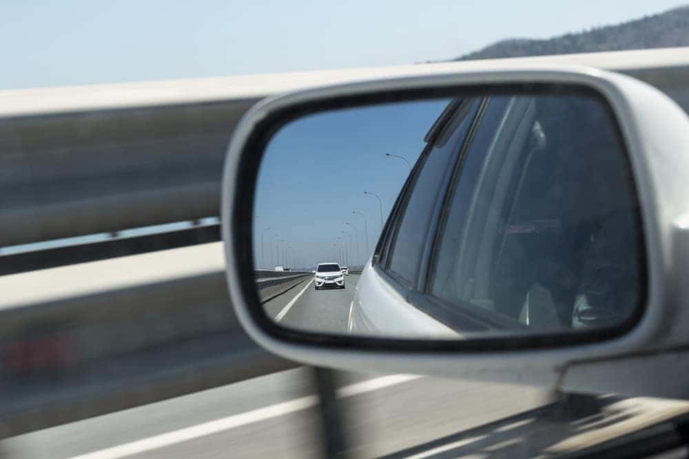 Car in Rear View Mirror