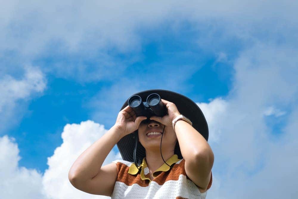 Young Woman With Binoculars