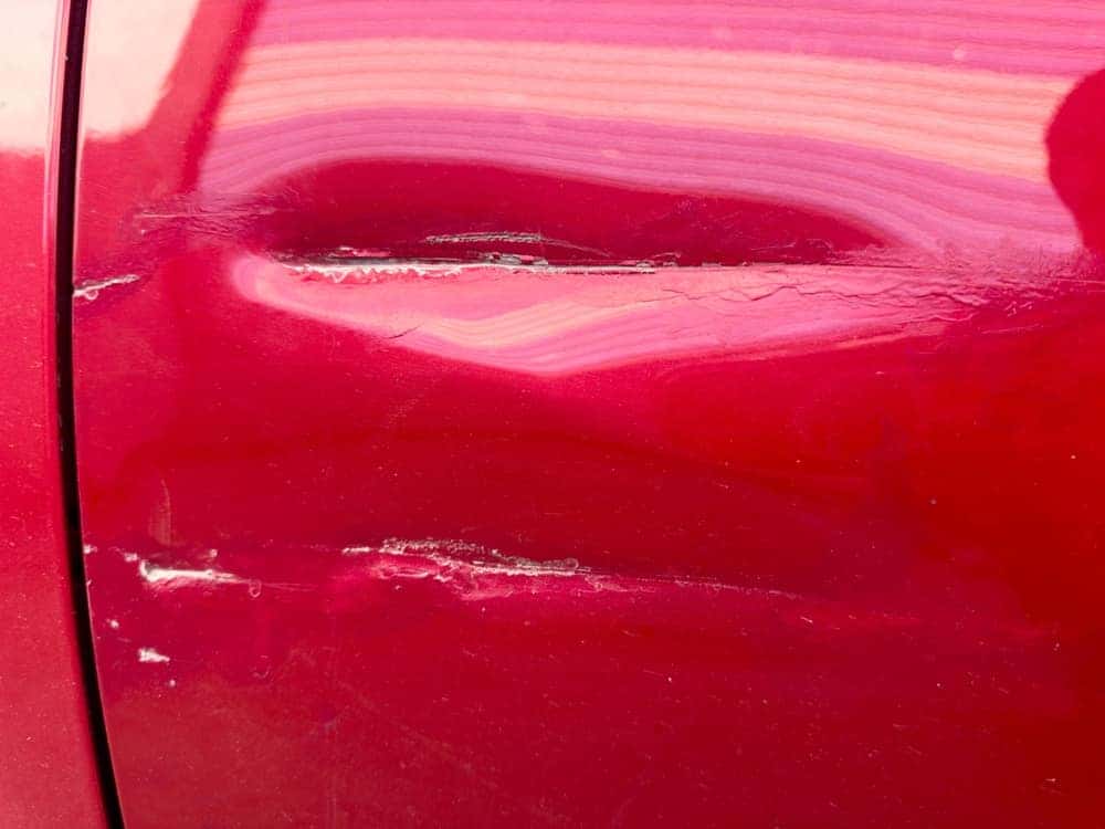 Deep Scratches on Read Car Paint