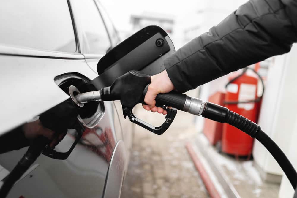 Person Refueling a Vehicle
