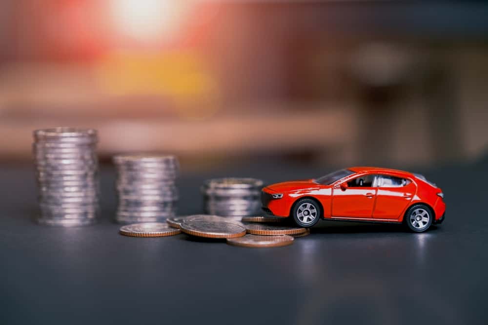 Coins With Miniature Car Concept