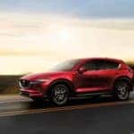 2018 Mazda CX-5 driving down the highway