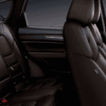 An image of the spacious Mazda CX-5 interior with luxurious brown seating.