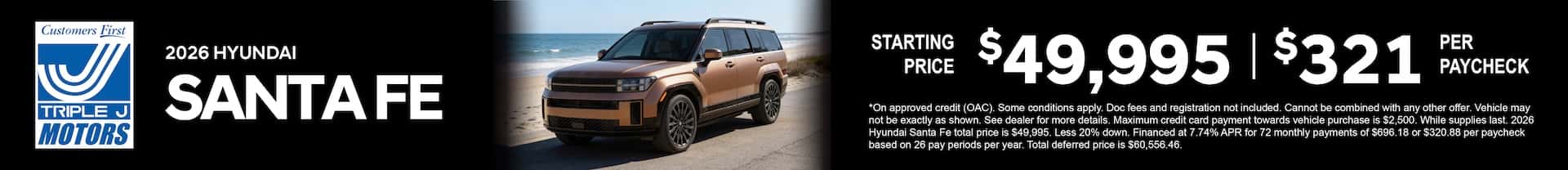 A bronze 2026 Hyundai Santa Fe parked by the beach