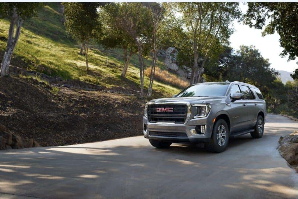 Yukon SUV on a shady road