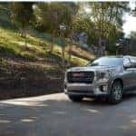 Yukon SUV on a shady road