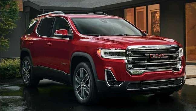 red GMC Acadia parked